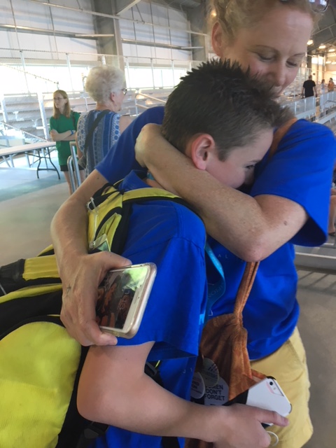 Alex Divers hugs his mom.